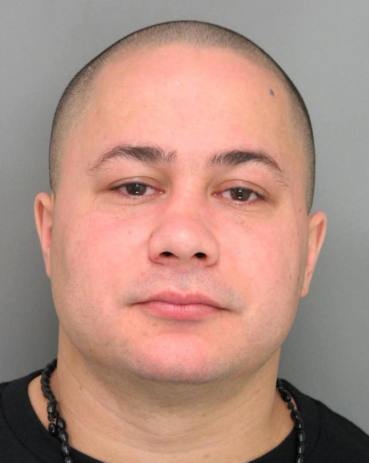 The FBI released a photo of Luis Alomar, wanted for at least 20 robberies along the Eastern Seaboard.