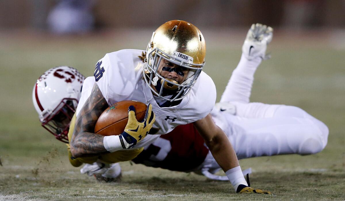 Notre Dame's Will Fuller is tackled by Stanford's Alameen Murphy during a game on Nov. 28.