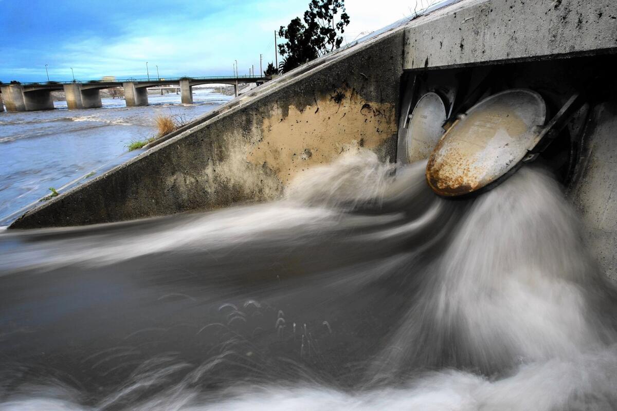 Stormwater gushes into the L.A. River; Los Angeles collects an average of 27,000 acre-feet of rainwater each year, and efforts are underway to greatly increase that amount.