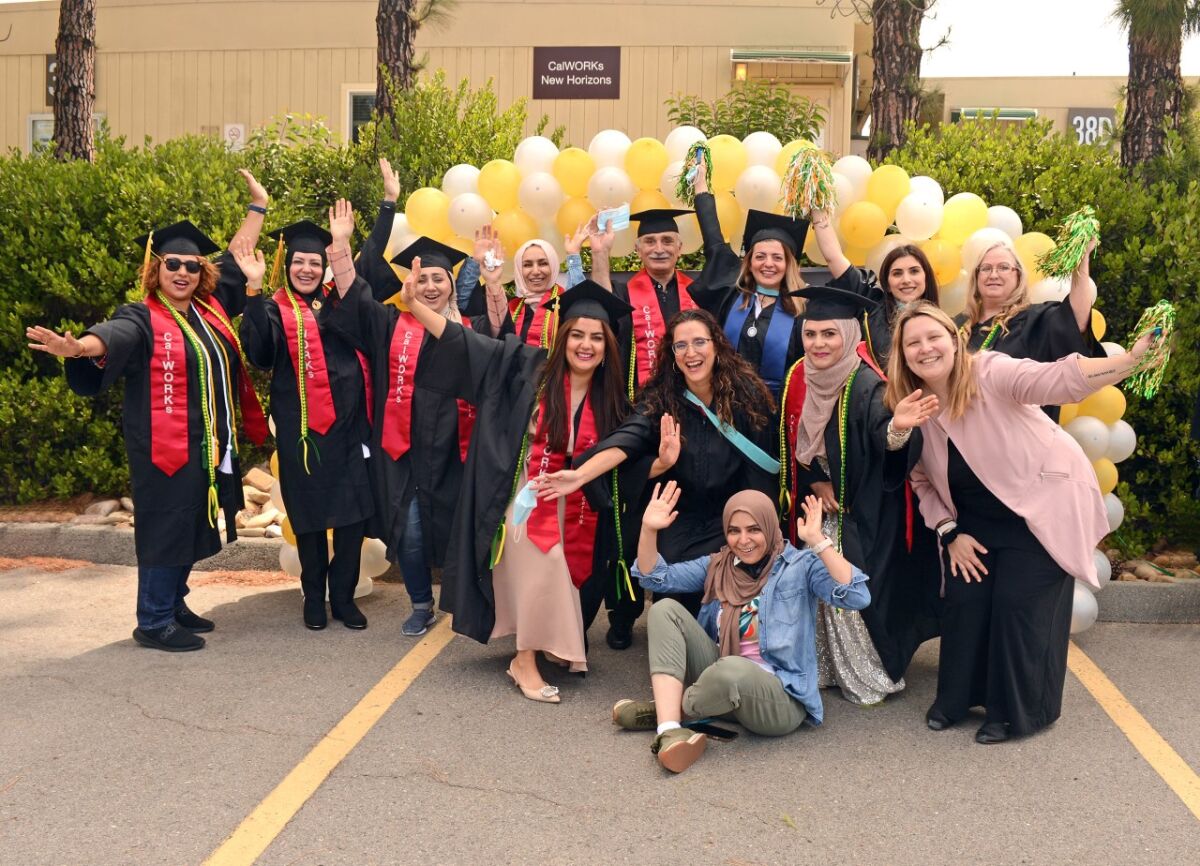 Grossmont College grads in CalWorks support group for single parents got students to donate gowns to help out future grads.