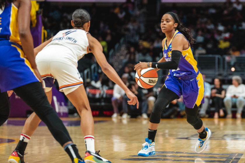 Jordin Canada drives against Phoenix's Skylar Diggins-Smith during the Sparks' 99-94 win May 25 at Crypto.com Arena.