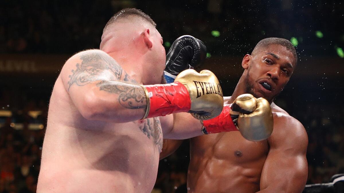 Andy Ruiz Jr. punches Anthony Joshua during their heavyweight title match in New York on June 1.