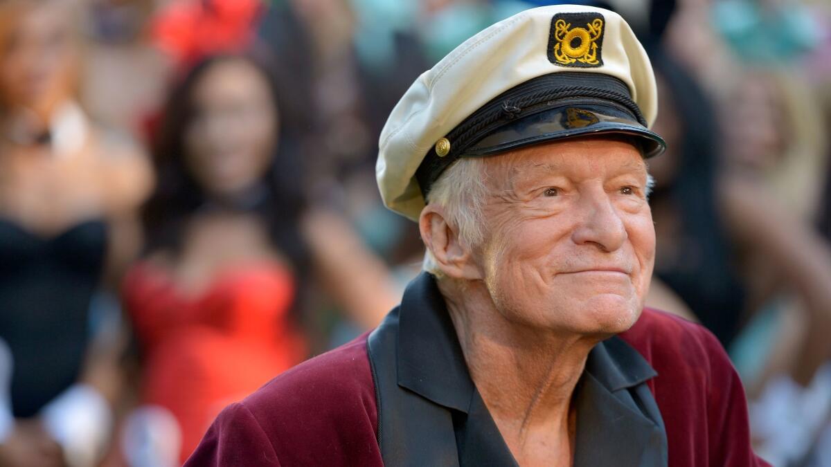 Playboy magazine founder Hugh Hefner died at age 91 on Wednesday at the Playboy Mansion in Los Angeles. He's seen here at Playboy's 60th anniversary celebration in 2014.