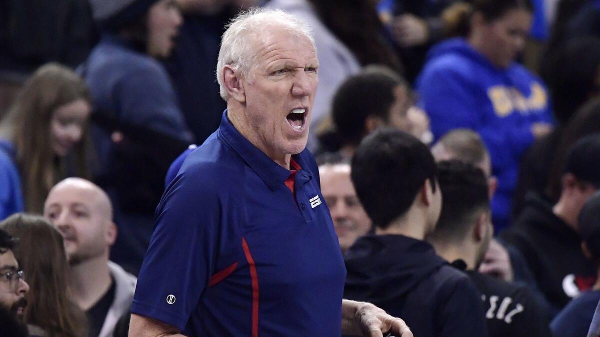 Former UCLA basketball player and NBA star Bill Walton talks after an NCAA college basketball game between UCLA and Stanford.