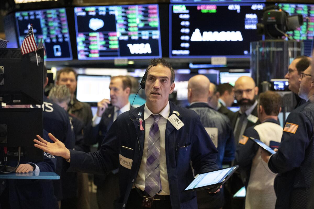 Stock trader Gregory Rowe at the New York Stock Exchange