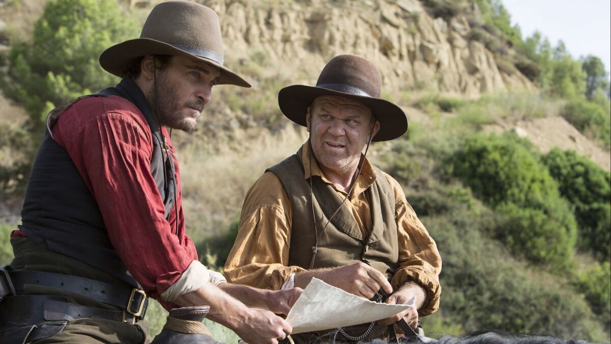 Joaquin Phoenix and John C. Reilly in "The Sisters Brothers."