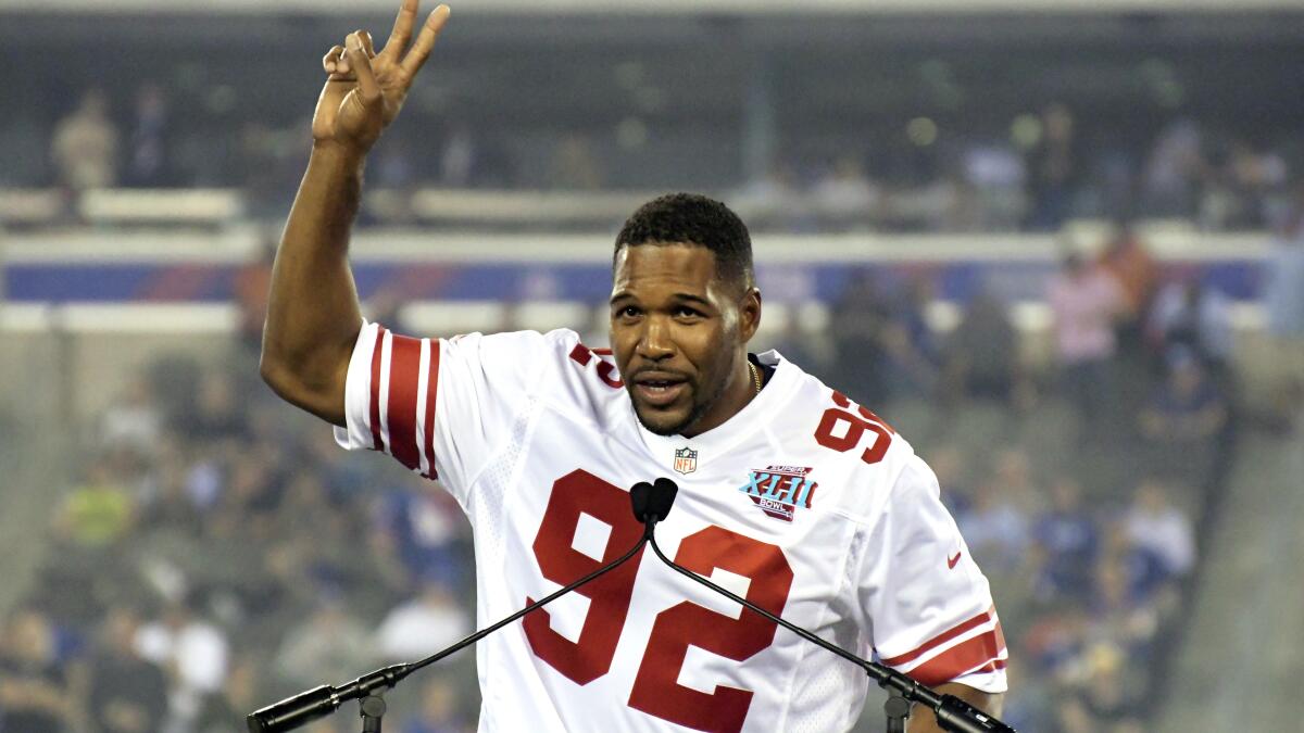 Michael Strahan's No. 92 to be retired November 28 vs. Eagles