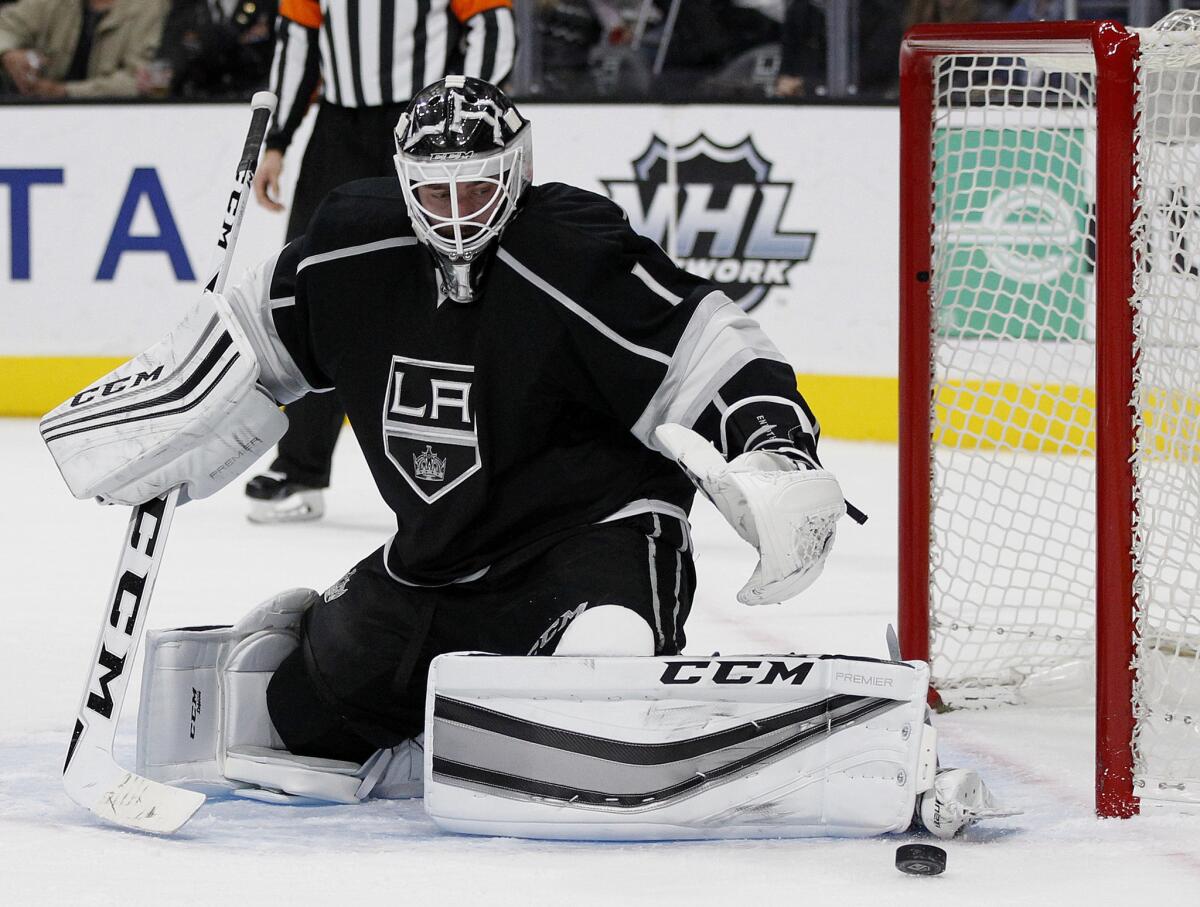 Kings goalie Jhonas Enroth makes a pad save against the Islanders during a game on Nov. 12.