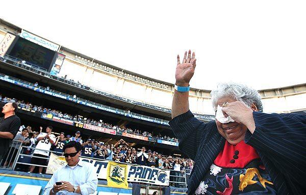 Junior Seau's mother, Luisa Seau, becomes emotional as she enters Qualcomm Stadium for a celebration of her son's life on Friday, May 11, 2012.