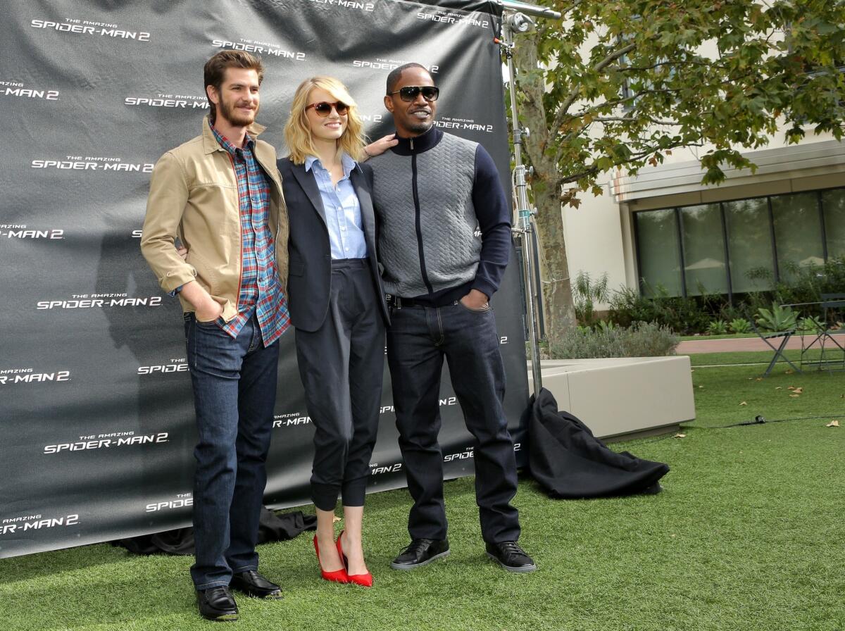 Andrew Garfield, Emma Stone and Jamie Foxx attend an event for "The Amazing Spider-Man 2" at Sony Pictures Studios in Culver City.