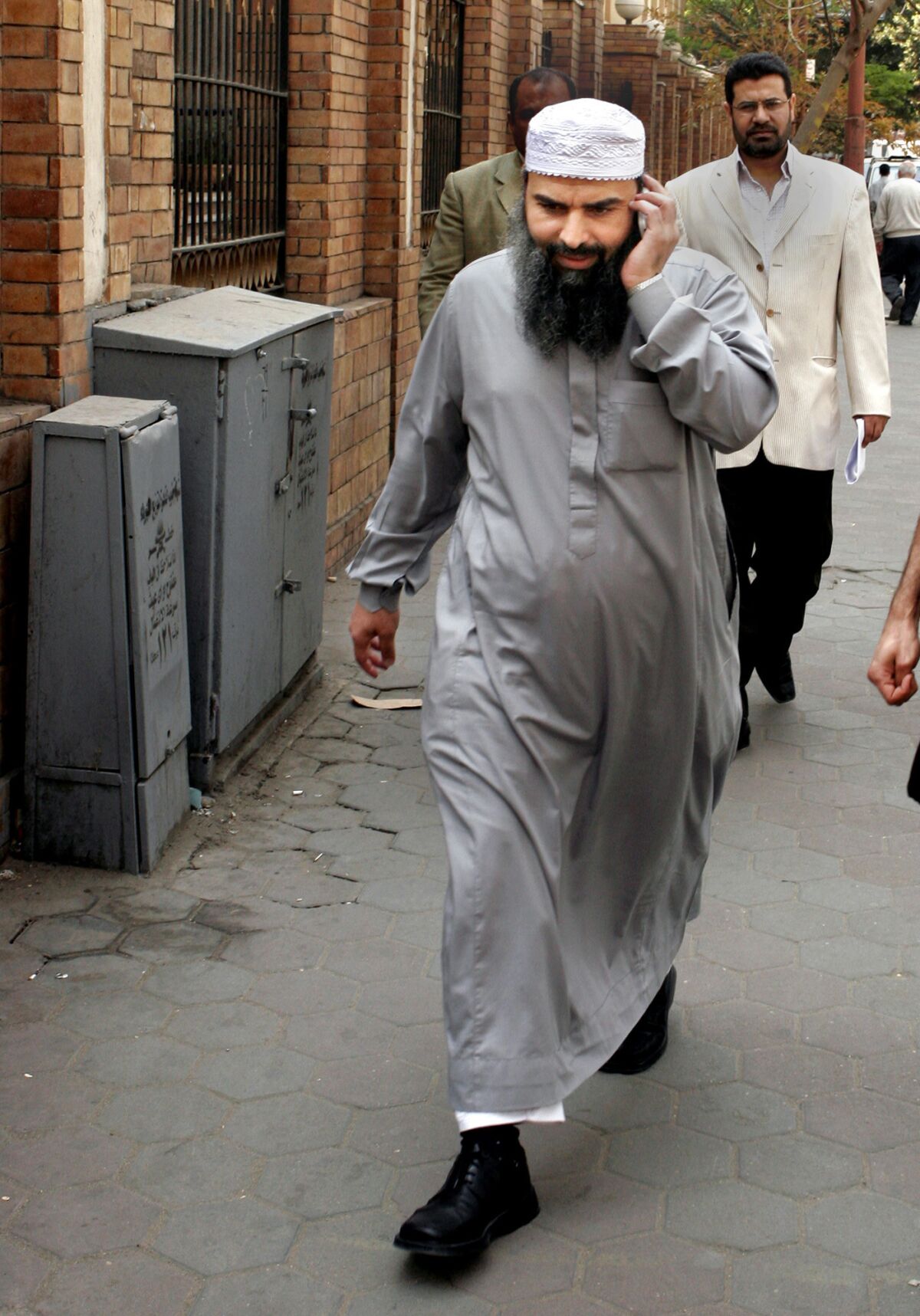 Egyptian cleric Hassan Mustafa Osama Nasr, also known as Abu Omar, walks down a Cairo street on April 11, 2007.
