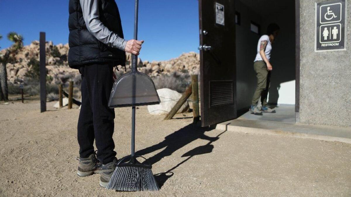 Volunteers prepare to clean a restroom at Joshua Tree National Park on Jan. 4.