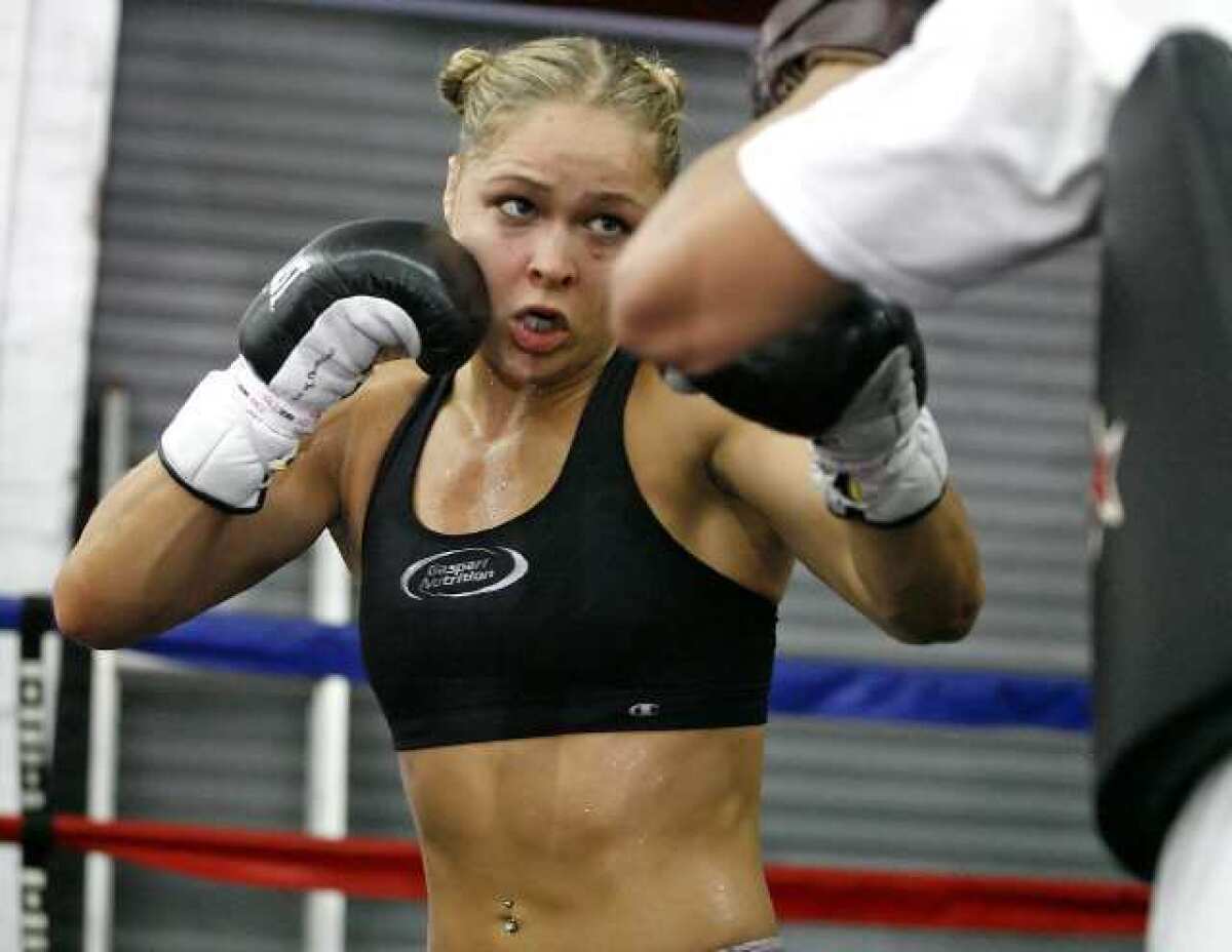 Ronda Rousey trains at Glendale Fighting Club for her first Strikeforce women's bantamweight title defense with Sarah Kaufman on Aug. 18 at the Valley View Casino in San Diego in the main event of Strikeforce's "Rousey vs. Kaufman" card live on Showtime.