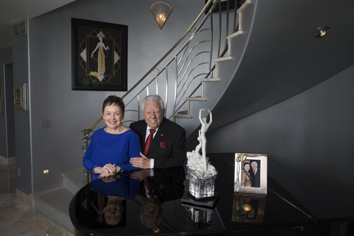 Sebastian Paul Musco and his wife, Marybelle, provided nearly half of the performing arts center's $82-million construction cost. They pose here in their Irvine penthouse.