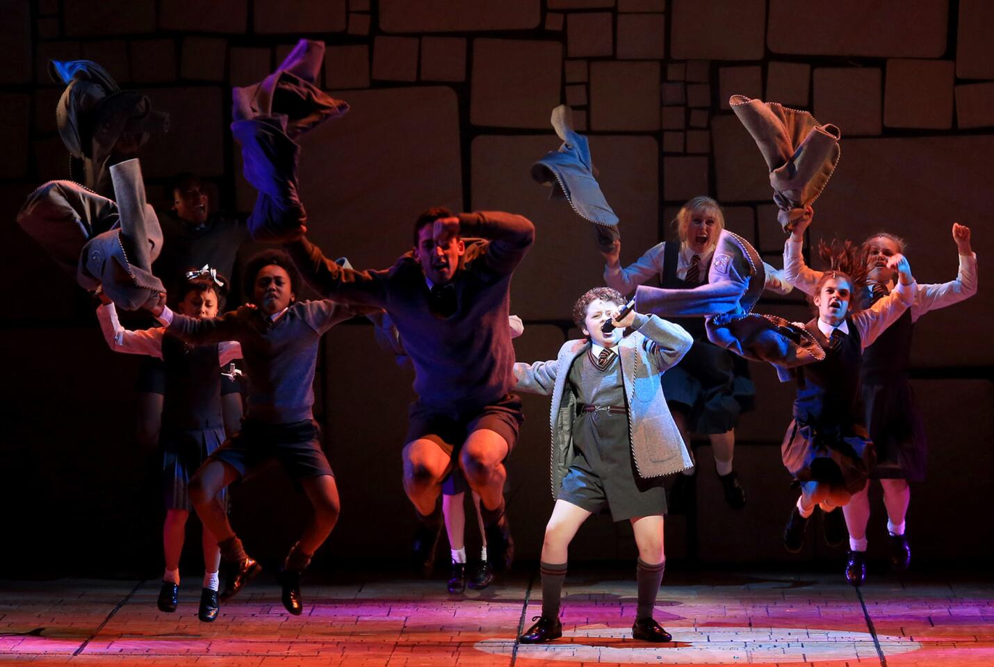 Evan Gray performs in "Matilda the Musical," based on the book by Roald Dahl and presented by the Royal Shakespeare Company and the Los Angeles Dodgers, playing at the Ahmanson Theatre.