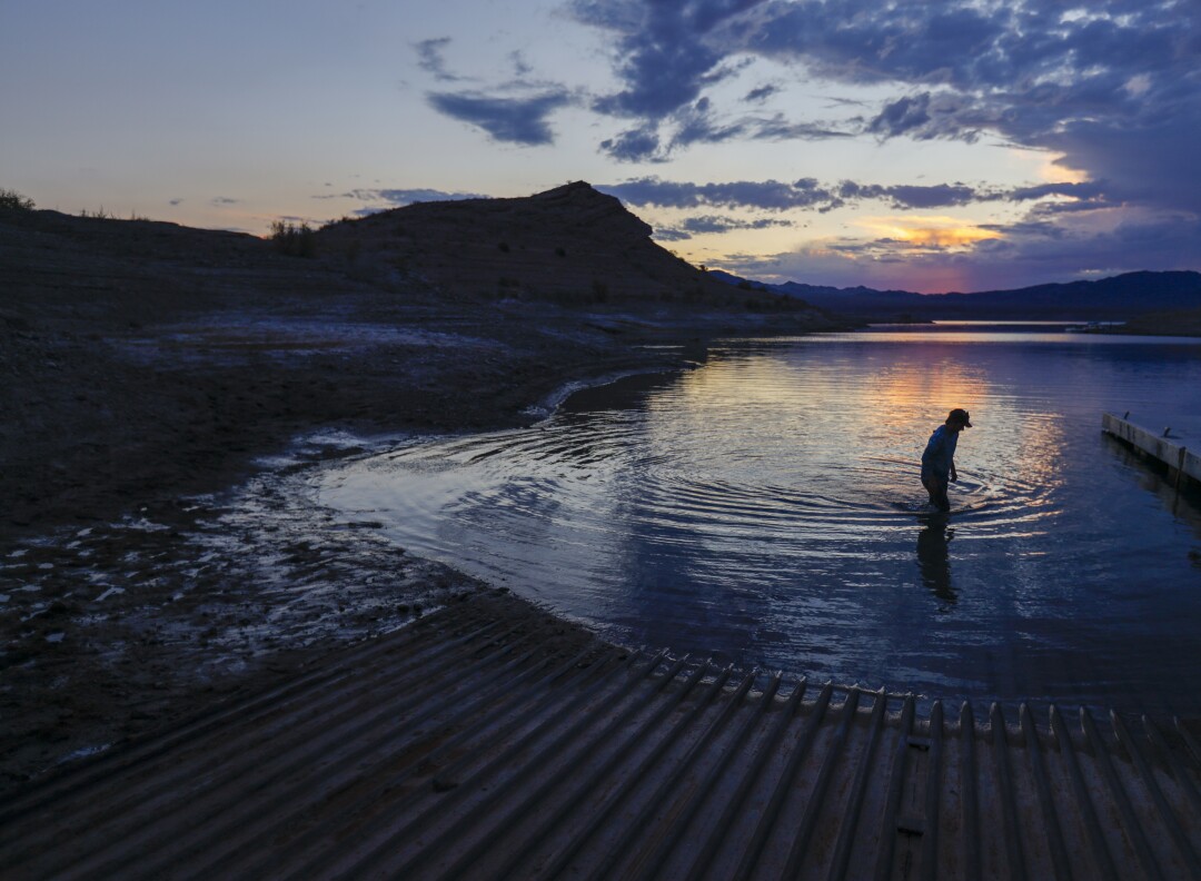 Eric Richins studies the water at a boat launch area 