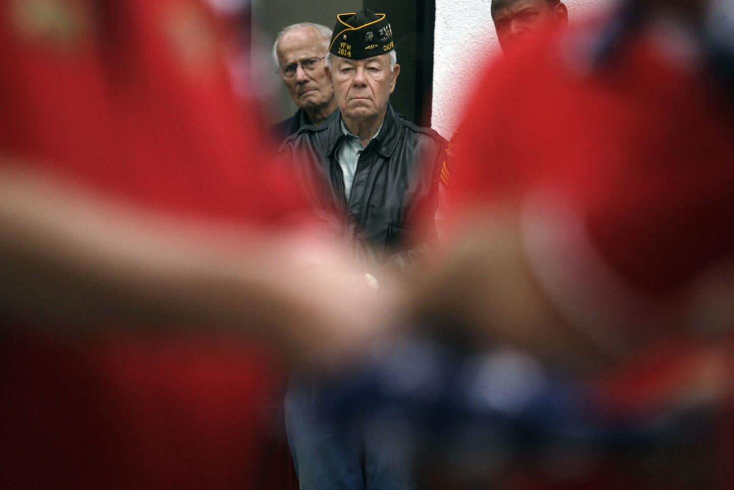 Vietnam veteran Jerry Peterson sits in silence during the flag folding ceremony for Welcome Home Vietnam Veterans Day, which took place at Ocean View and Honolulu Aves. in Montrose on Saturday, April 13, 2013.