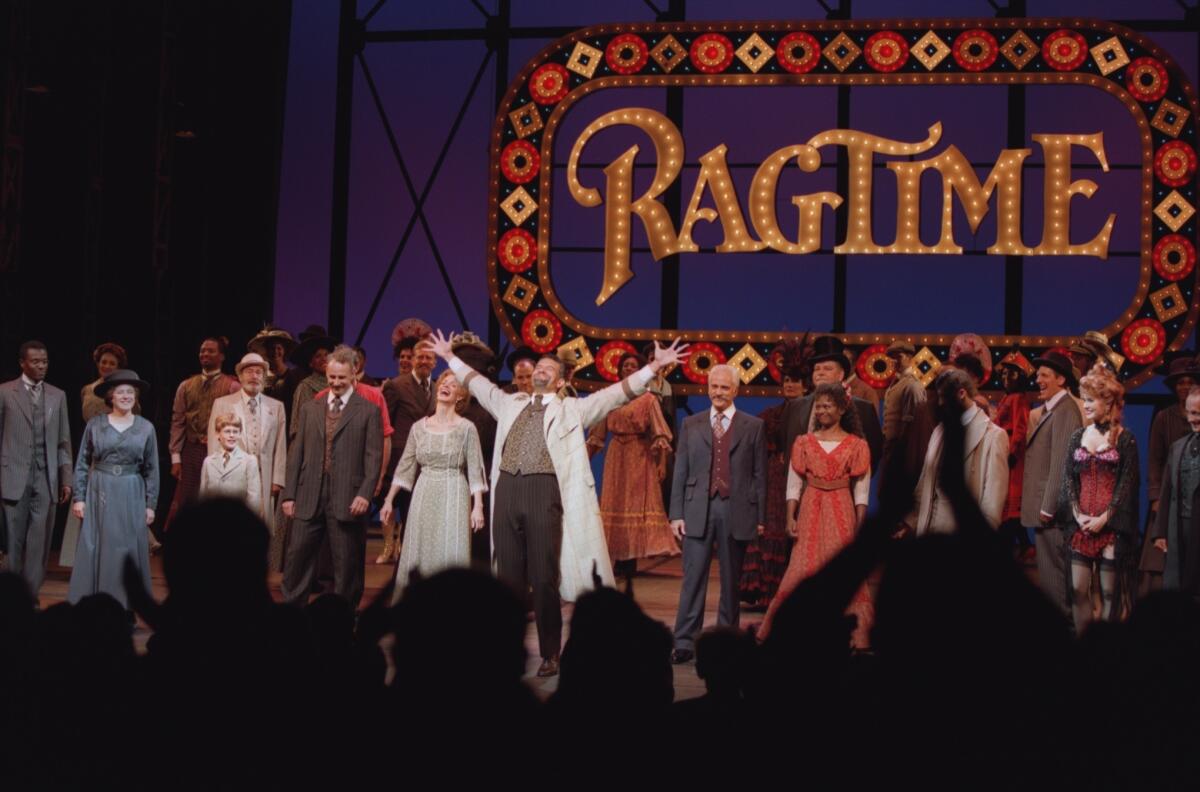 The Costa Mesa Playhouse has had trouble filling black male roles for its amateur production next month of "Ragtime." Above, a 1997 production of "Ragtime" at the Shubert Theatre in Los Angeles.