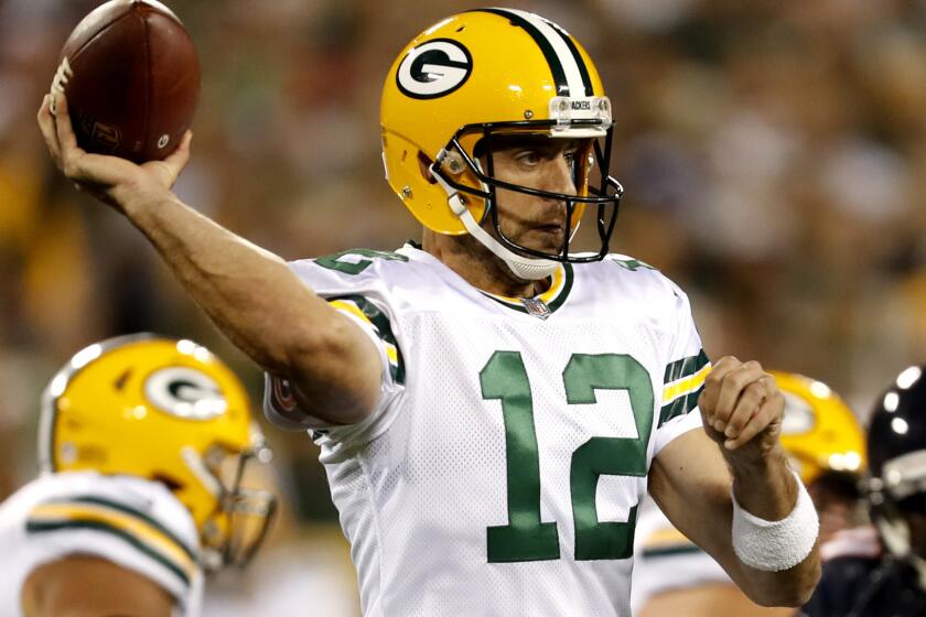Green Bay Packers' Aaron Rodgers throws during the first half of an NFL football game against the Chicago Bears Thursday, Sept. 28, 2017, in Green Bay, Wis. (AP Photo/Matt Ludtke)