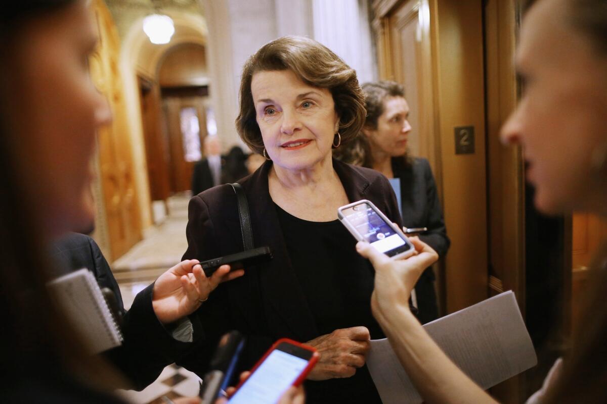 Sen. Dianne Feinstein (D-Calif.) leaves the Senate floor in January.