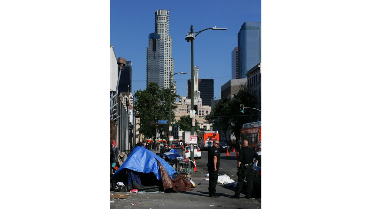 Skid row is in the shadow of downtown's skyscrapers.