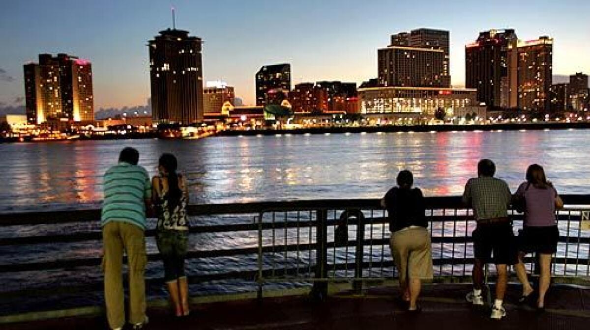 As lights flicker across the Mississippi River, tourists and commuters on the deck of the Canal Street ferry watch the sun set over New Orleans. This city, some experts say, has an opportunity few get: to rebuild from the ground up.
