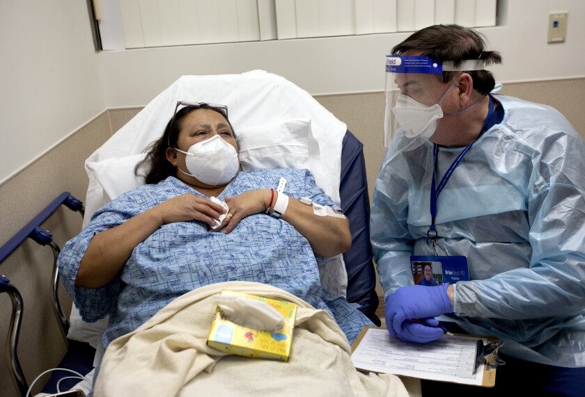 Maria Mandujanu, left, was recently diagnosed with COVID-19.