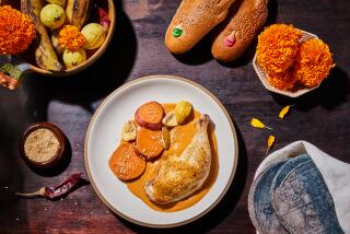 Guava Mole with Chicken and Roasted Sweet Potatoes on Thursday, October 12th, 2023 in Los Angeles, CA (Andrea D'Agosto/For The Times; prop styling by Jennifer Sacks)