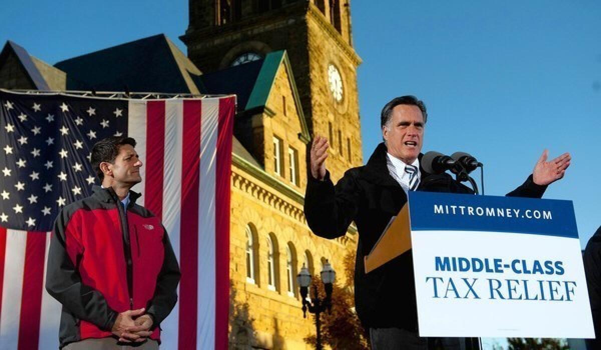 Mitt Romney and running mate Paul Ryan campaign in Ohio. Aides say Romney's foreign policy would aim to avoid "the mistakes and miscalculations of the last decade."