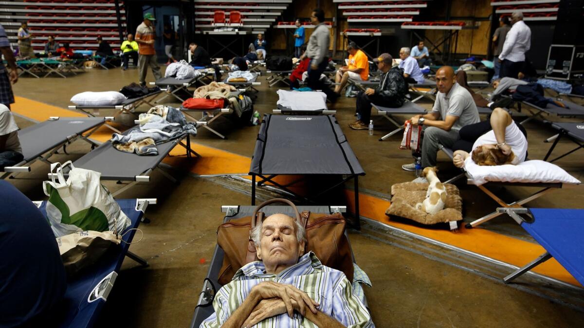 The Roberto Clemente Coliseum in San Juan, Puerto Rico, has become a shelter for more than 500 storm evacuees.