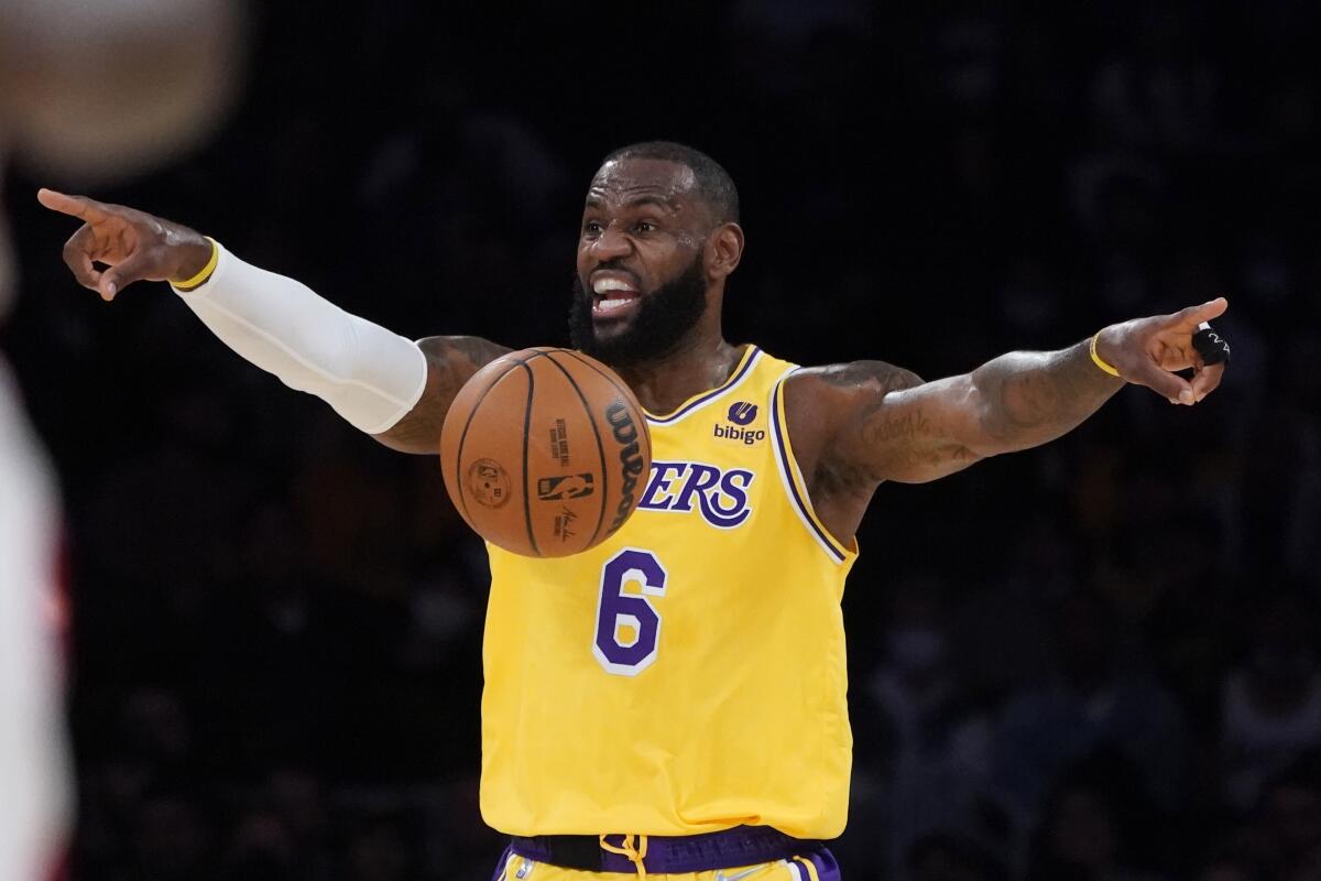 Lakers forward LeBron James directs teammates during a game against the Houston Rockets on Nov. 2.