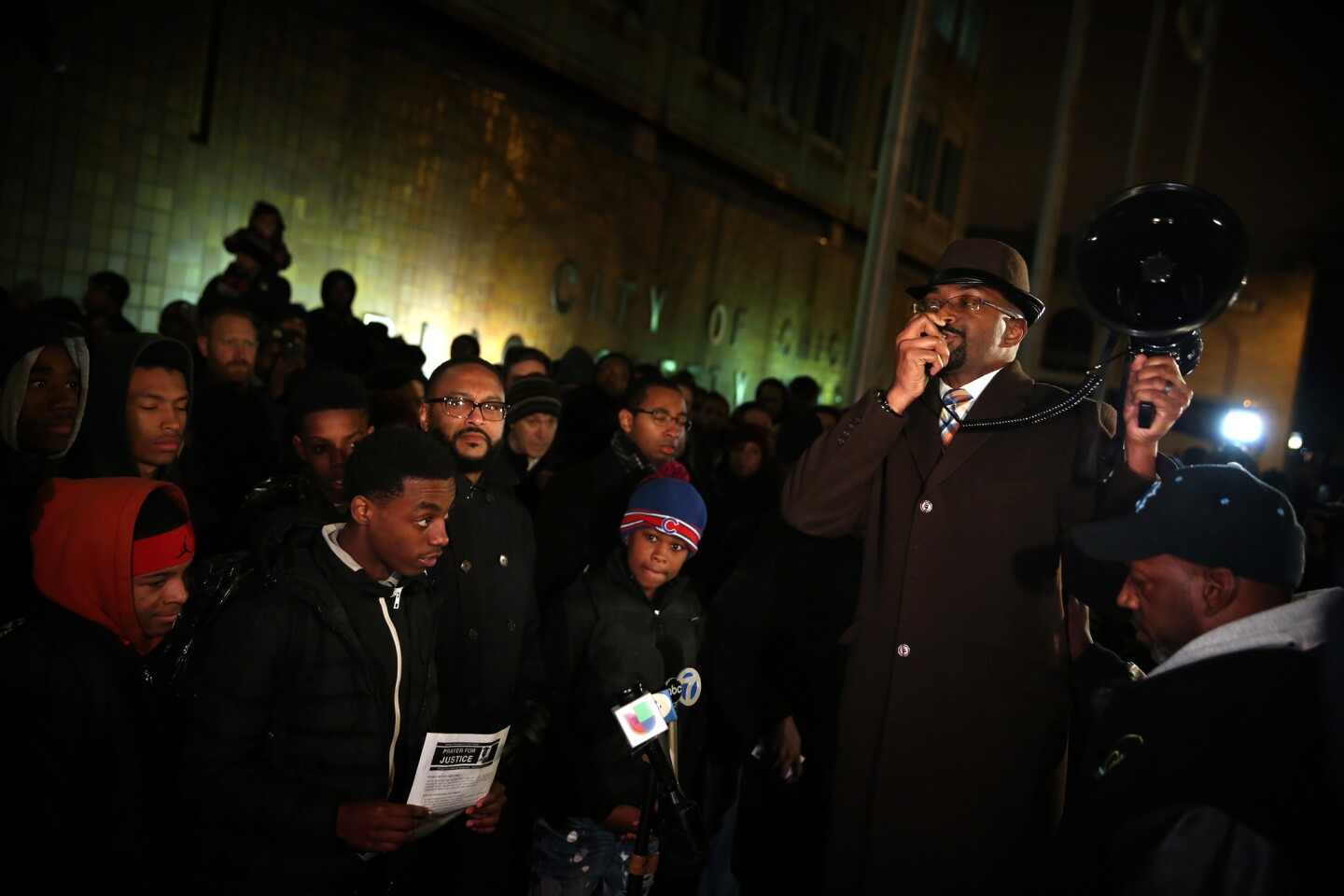 A prayer vigil is held in front of the Chicago Police Department headquarters in memory of Laquan McDonald and to call for a federal investigation into the case, Nov. 30, 2015.