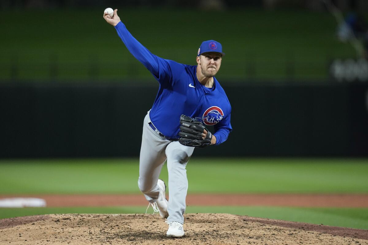 Chicago Cubs starting pitcher Jameson Taillon delivers against the Kansas City Royals on March 21.