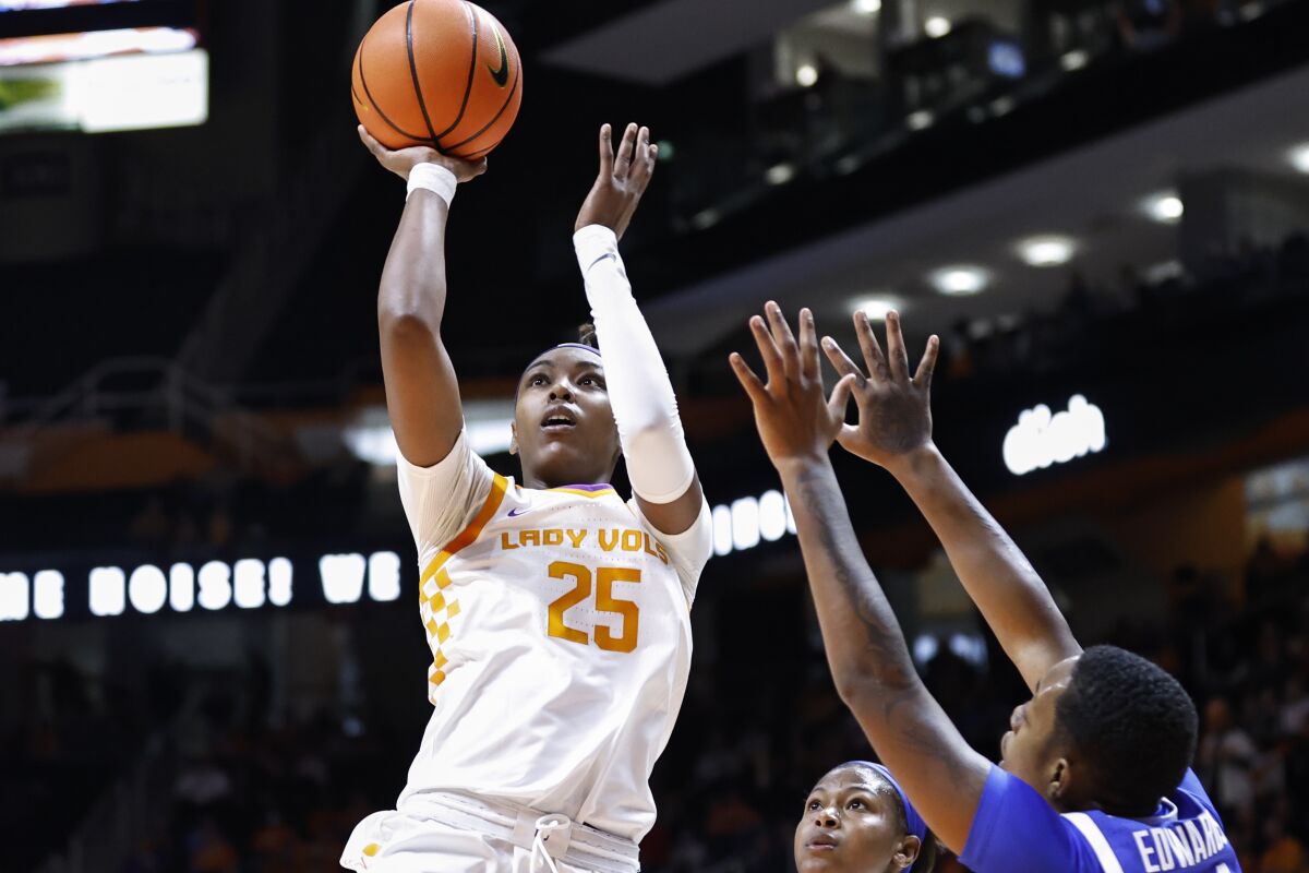 Tennessee guard Jordan Horston (25) shoots over Kentucky forward Dre'una Edwards (44) during an NCAA college basketball game Sunday, Jan. 16, 2022, in Knoxville, Tenn. (AP Photo/Wade Payne)