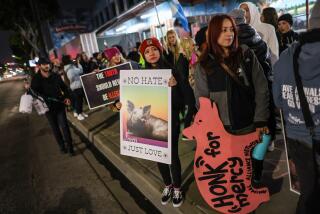 Vernon, CA, Thursday, February 2, 2023 - After years of weekly vigil's, activists gather one last time outside Farmer John meat processing plant the last day it was to take delivery of pigs for slaughter. (Robert Gauthier/Los Angeles Times)