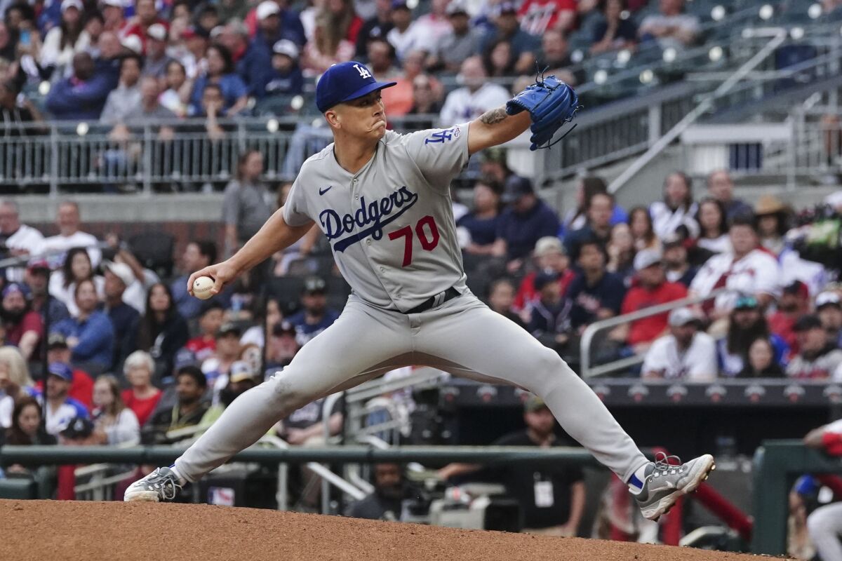 Dodgers rookie pitcher Bobby Miller works in the first inning against the Atlanta Braves in Atlanta.