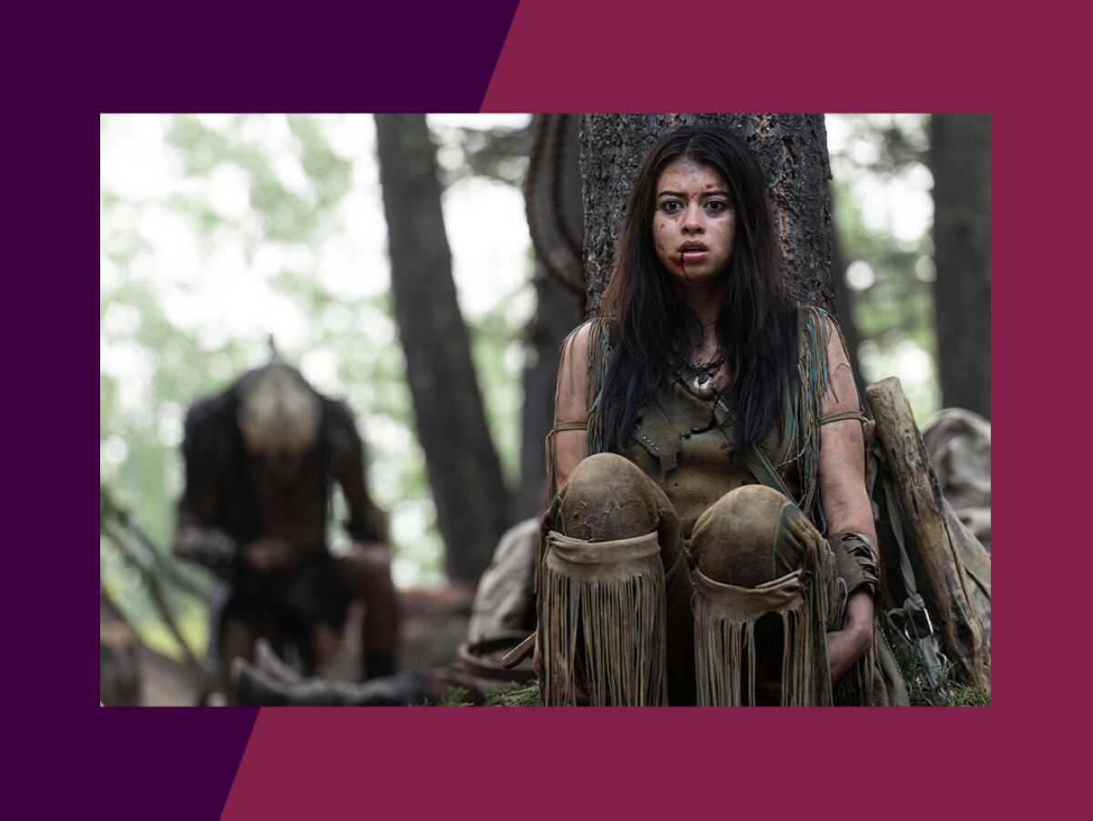 A young Comanche woman hides from the Predator in a scene from "Prey."