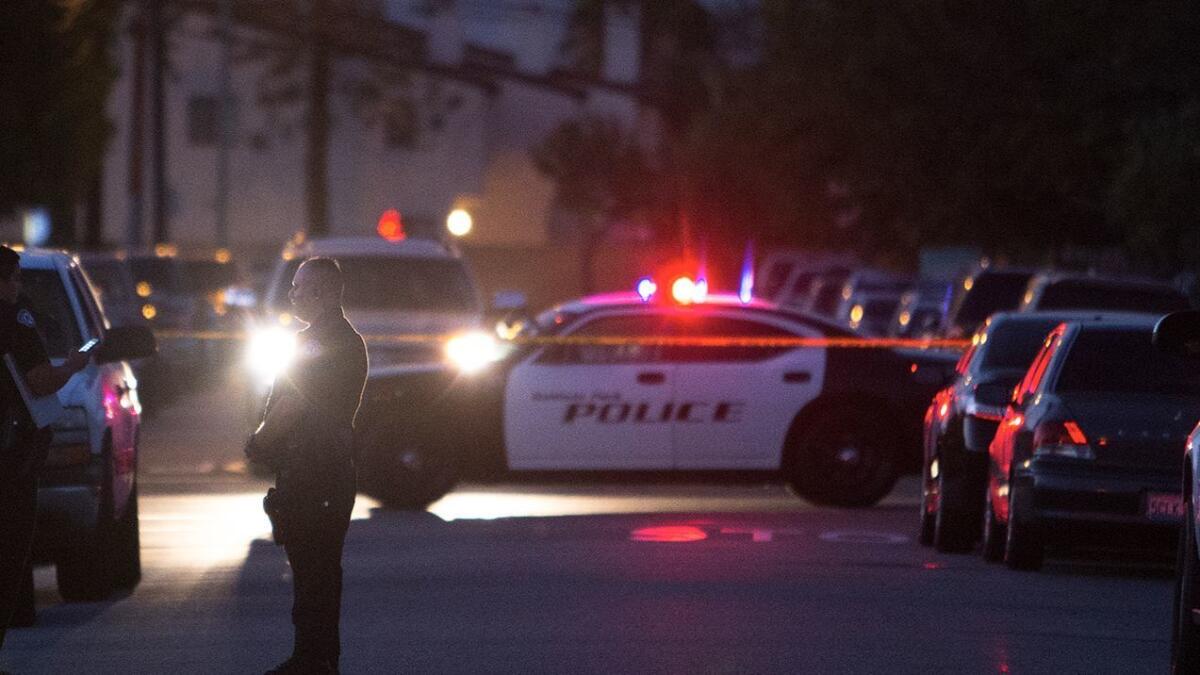 Baldwin Park police block a street. The former police chief is suing the city over his firing, alleging discrimination.