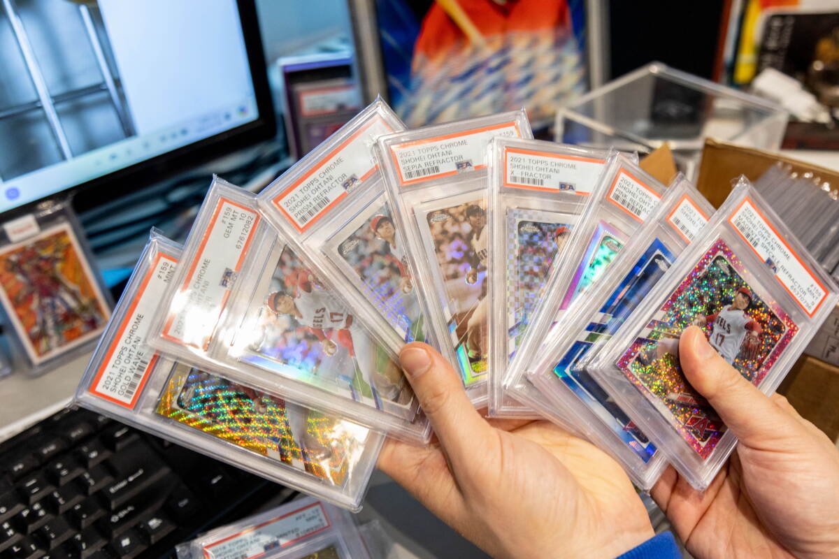 Baseball cards in protective covers.