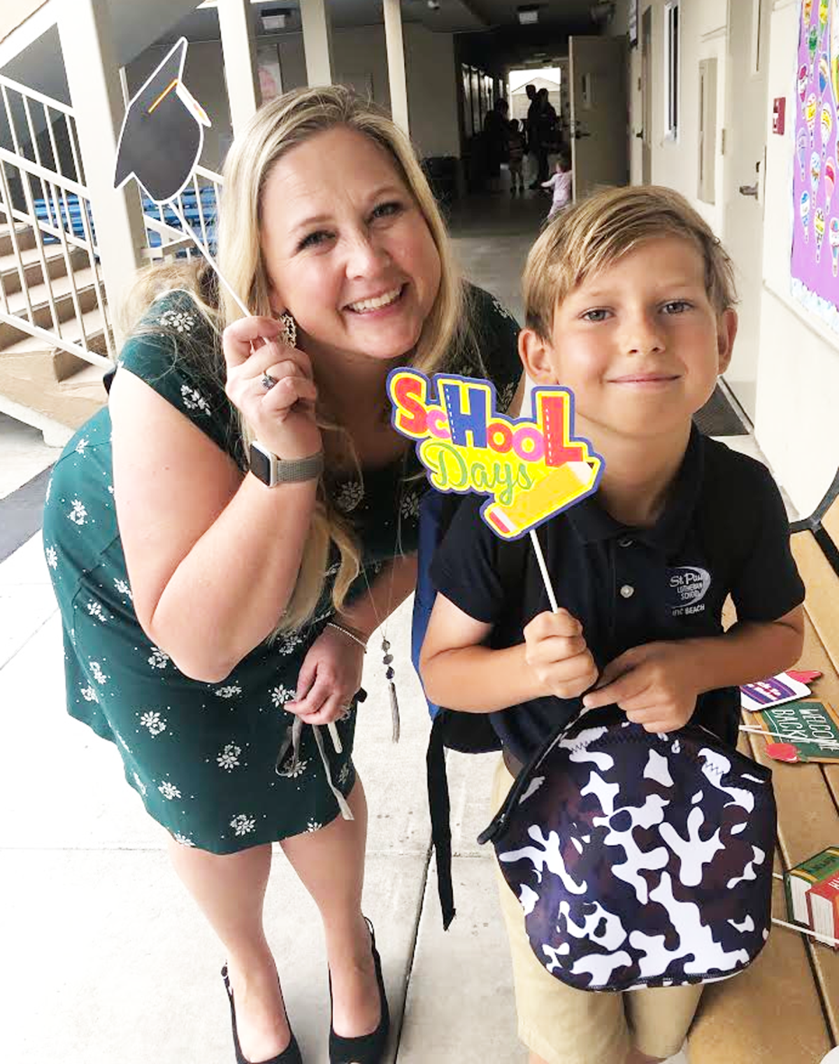 Principal Meredith Binnie with a student.