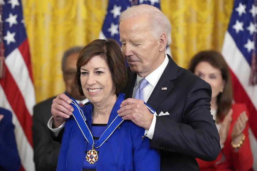 President Joe Biden awards the nation's highest civilian honor, the Presidential Medal of Freedom, to Ellen Ochoa, NASA astronaut and former director of the Johnson Space Center, during a ceremony in the East Room of the White House, Friday, May 3, 2024, in Washington. (AP Photo/Alex Brandon)