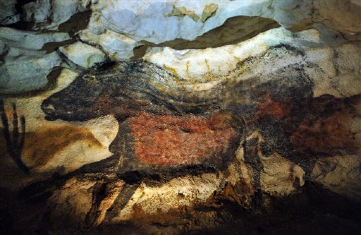 This July 25, 2008 file photo shows part of Lascaux famed cave drawings in southwest France. Geologists, biologists and other scientists convened in Paris Thursday, Feb. 26, 2009 for a conference on how to stop the spread of fungus stains, aggravated by global warming, that threaten France's famed Lascaux cave drawings. (AP Photo/Pierre Andrieu, Pool)