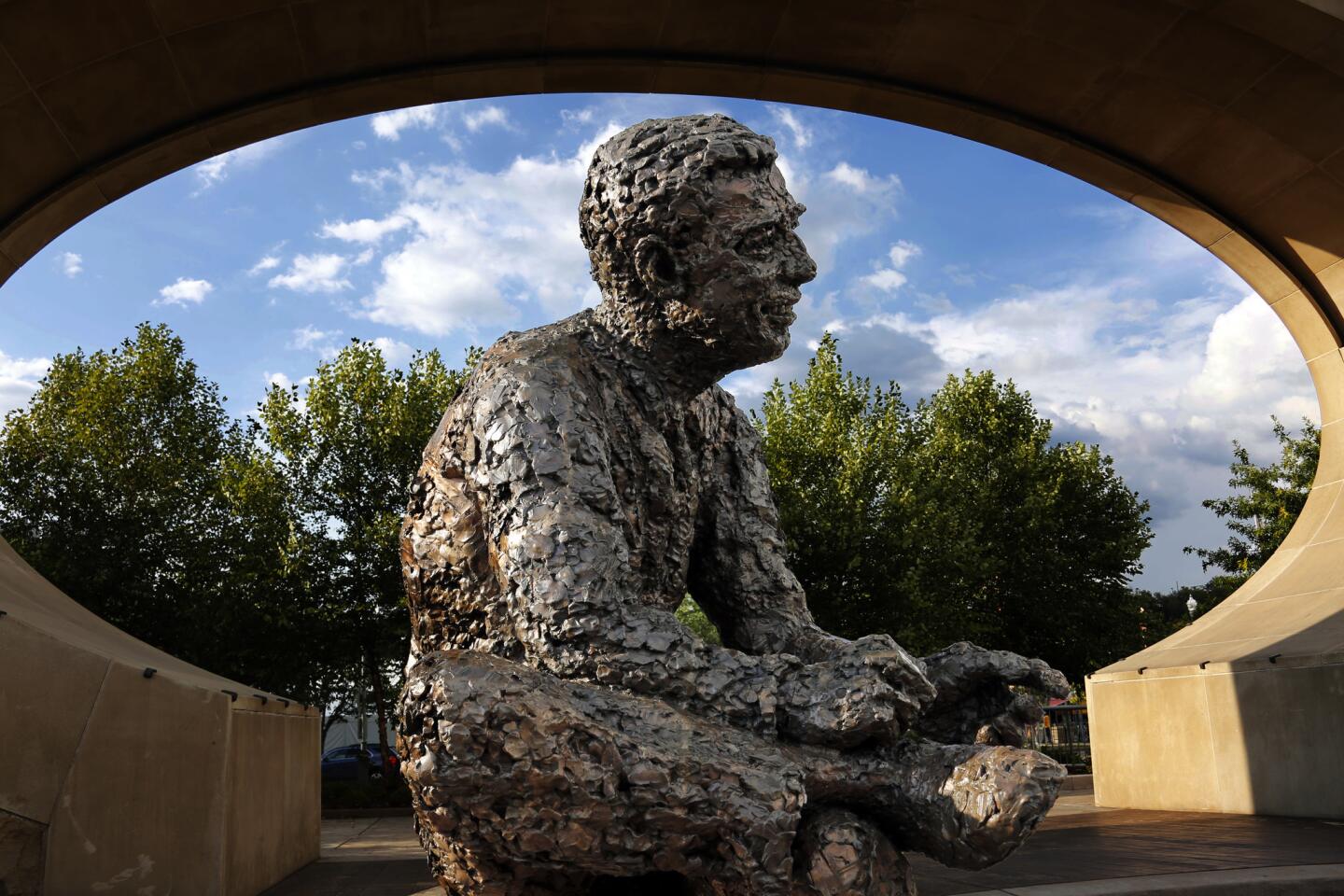 A statue of Mr. Fred Rogers at the Mr. Rogers Memorial on the Northside of Pittsburgh. A new Fred Rogers Trail promoted by VisitPA.com includes the sculpture along with museums and other sites.