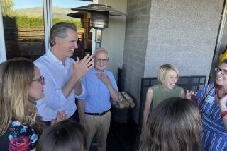 Gov. Gavin Newsom speaks with supporters at a private fundraiser in Boise, Idaho. 