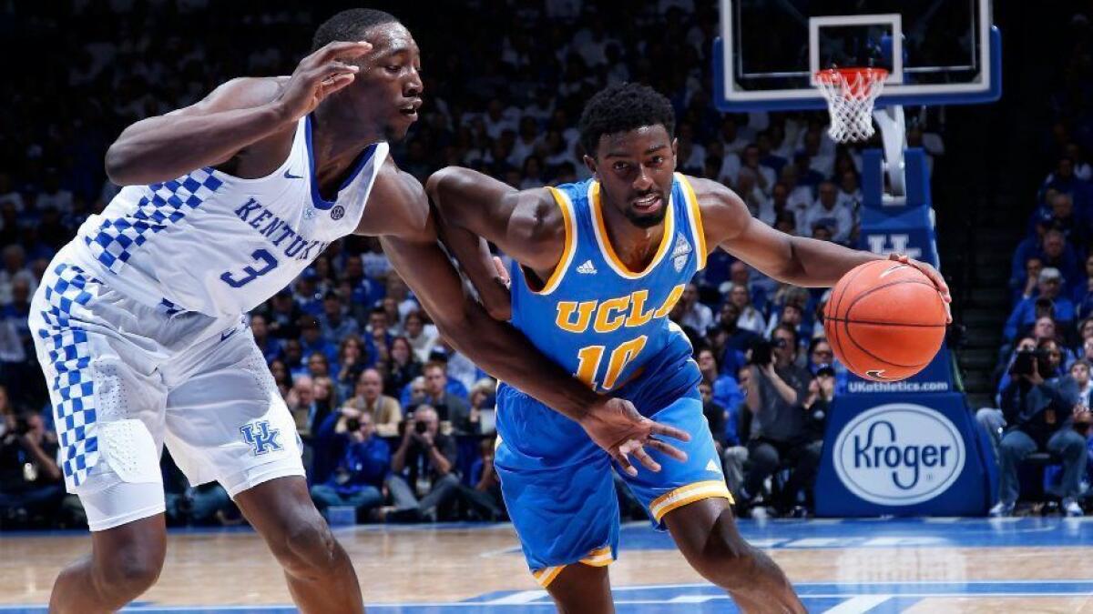 Kentucky center Bam Adebayo (3) tries to cut off a drive by UCLA guard Isaac Hamilton during a game last season.