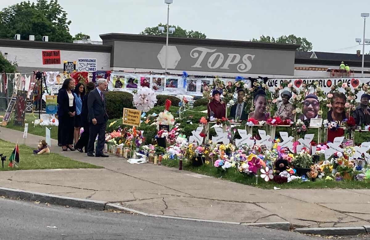 Attorney General Merrick Garland. visits the Tops Friendly Market grocery store in Buffalo, N.Y., on Wednesday, June 15, 2022, the site of a May 14 mass shooting in which 10 Black people were killed. Garland was in Buffalo to announce federal hate crime charges against the 18-year-old shooter, Payton Gendron. (AP Photo/Carolyn Thompson)
