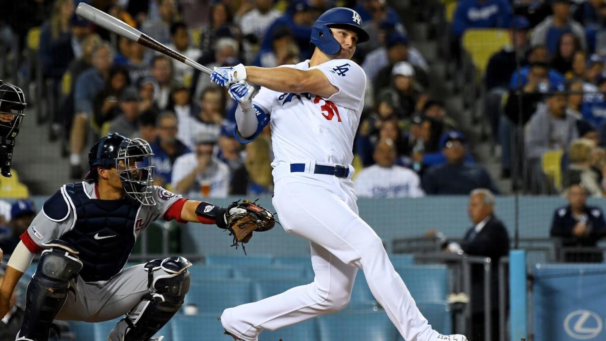 Dodgers' Joc Pederson hits a solo home run, for his second of the game, in the fifth inning against the Washington Nationals at Dodger Stadium on Friday.