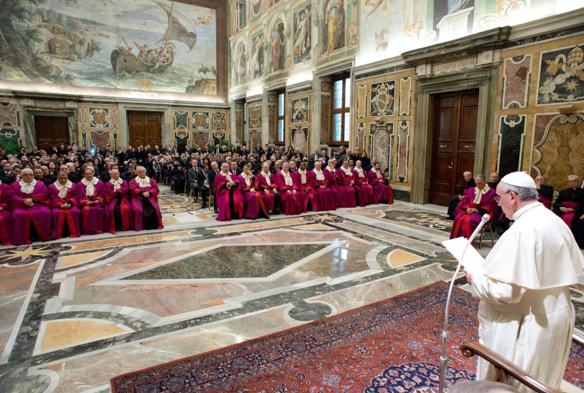 This picture released by the Vatican press office shows Pope Francis speaking to officials of the tribunal of the Roman Rota at Vatican.