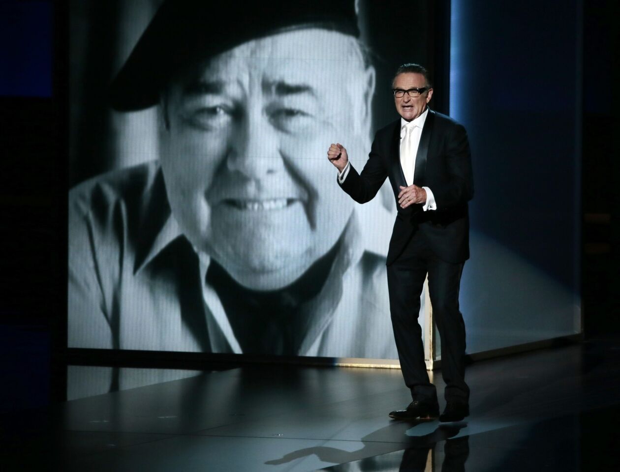 The Emmys are a celebration of TV, which is nice because most everything on TV is archived in some capacity. So it was an odd choice to not air a single moment of footage of the late Jonathan Winters during his tribute. Instead, Robin Williams spoke eloquently about the man and even performed a bit of one of his most famous routines. It's nice that Williams has such clear memories of Winters, the rest of us will have to make due with Williams' Winters impression. Or Rob Reiner's best Archie Bunker.