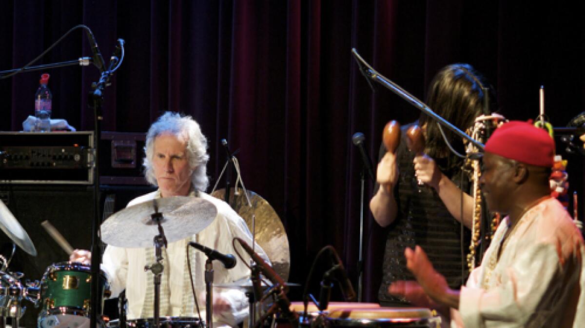 AND THE BEAT GOES ON: Densmore, now 63, wields the sticks onstage with his new foursome, Tribaljazz.